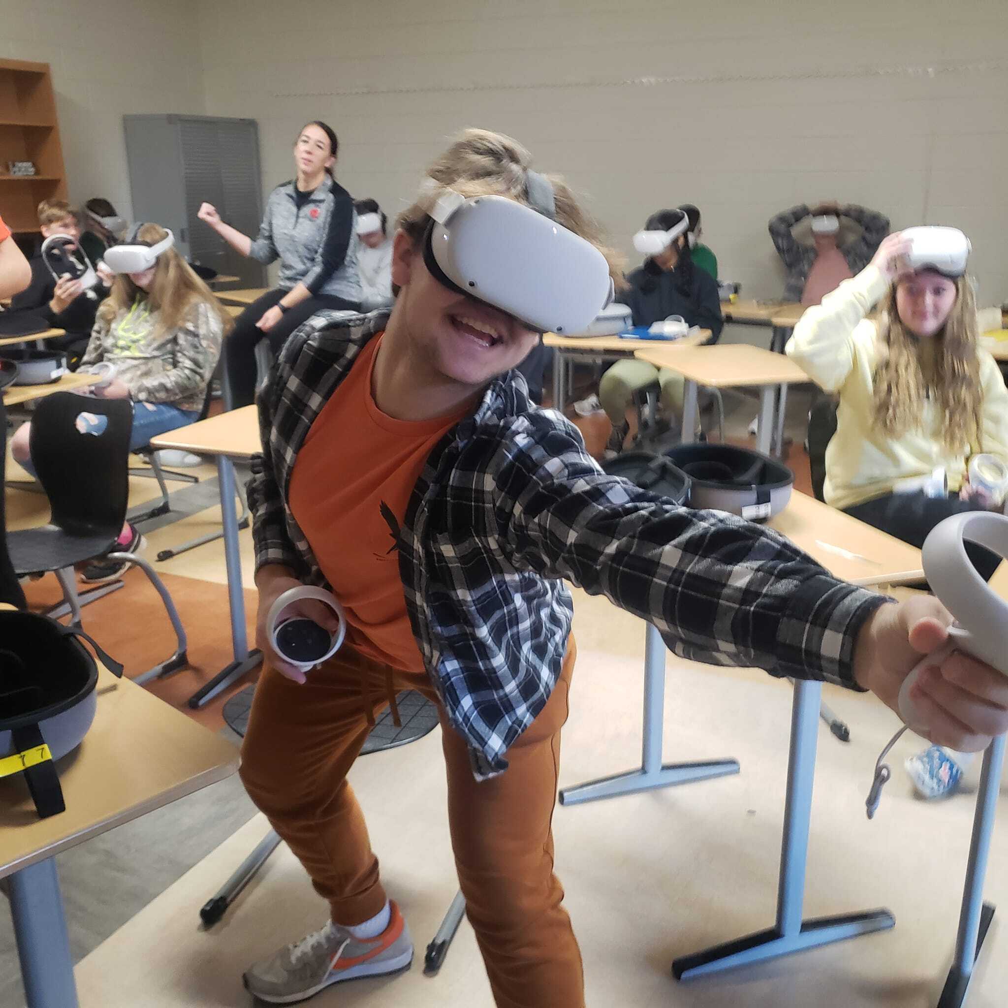 student with vr headseat
