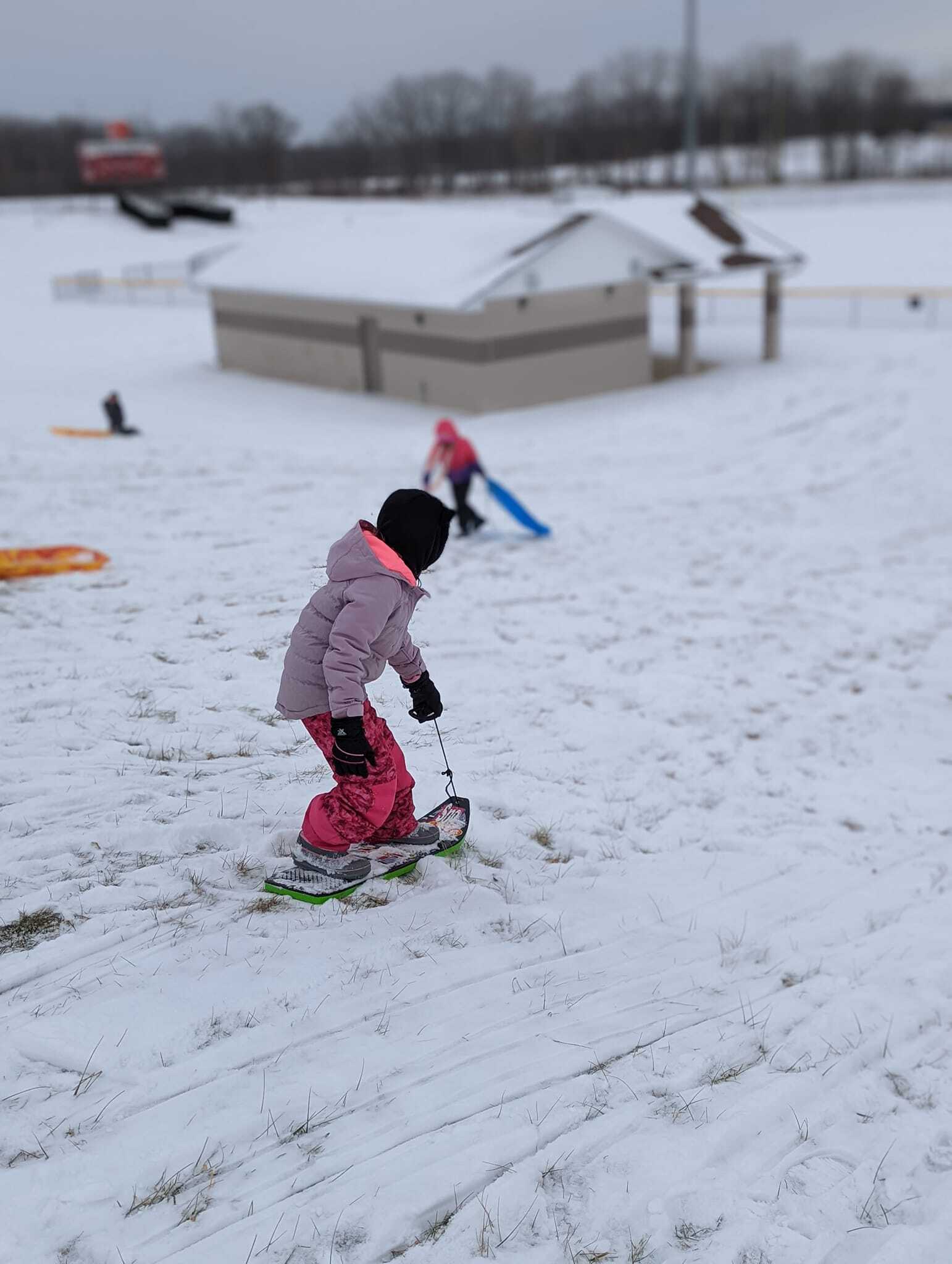 Student snowboarding